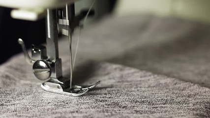 Work on the sewing machine. Close-up place for text.