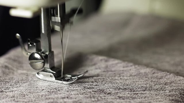 Work on the sewing machine. Close-up place for text.
