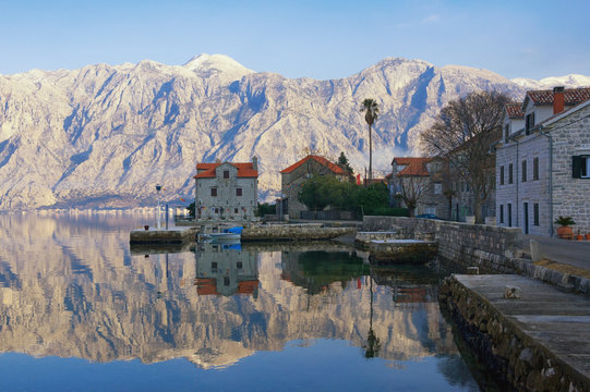 Beautiful winter Mediterranean landscape. Montenegro, Adriatic Sea, Bay of Kotor.  View of seaside village of Stoliv