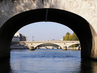 View of the bridge over the Seine on a sunny day.