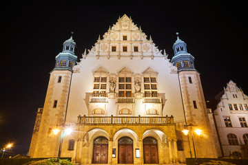 Fototapeta na wymiar Neorenaissance facade of the building of the university auditorium at night in Poznan.