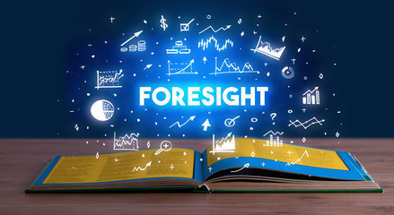 FORESIGHT inscription coming out from an open book, business concept