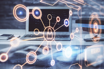 Computer on desktop with social network theme icon. Multi exposure. Concept of international connections.