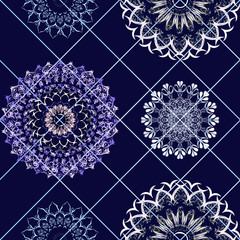 Seamless pattern - carved figures - white-blue snowflakes, crystals. Rhombuses - geometric bright blue background. Christmas, winter, holidays, snow, congratulations.