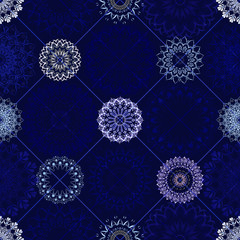 Seamless pattern - carved figures - white-blue snowflakes, crystals. Rhombuses - geometric bright blue background. Christmas, winter, holidays, snow, congratulations.
