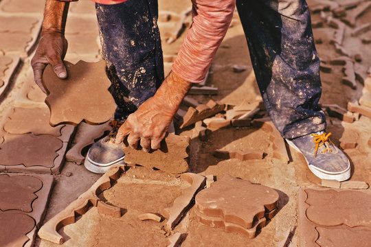 Man working at tile factory