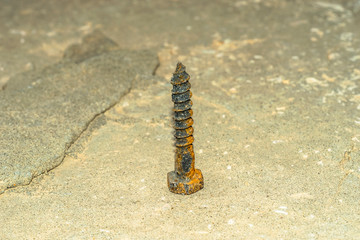 closeup of an old and rusty bolt 