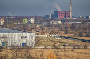 Fototapeta premium Factories in an industrial area among the forest