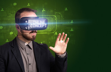 Businessman looking through Virtual Reality glasses with ONLINE CONCEPT inscription, social networking concept