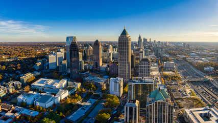 Aerial Panoramic picture of downtown Atlanta Skyline during the golden hour - obrazy, fototapety, plakaty