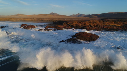 Contemplating the force of the sea and the sunset from a wonderful place