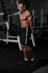 Fototapeta na wymiar Portrait Of A Physically Fit Muscular Mature Man