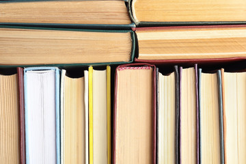 Many different hardcover books as background, top view
