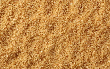 Brown cane sugar background and texture