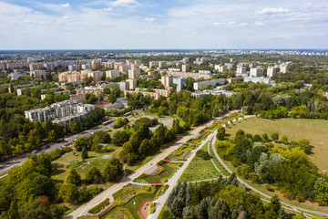 Warsaw, Poland. 20. August. 2019. Aerial view of the cityscape with streets and public transport. Drone flies towards buildings and skyscrapers in the city.