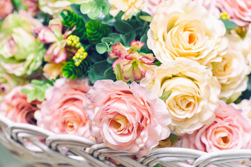Bouquet of artificial pink roses close-up. Selective focus
