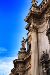 Tower bell, sculptures and carved stone details of the Cathedral of Murcia