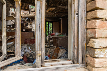 Abandoned home. Damaged house after earthquake.