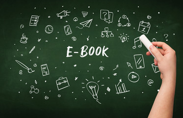 Hand drawing E-BOOK inscription with white chalk on blackboard, education concept