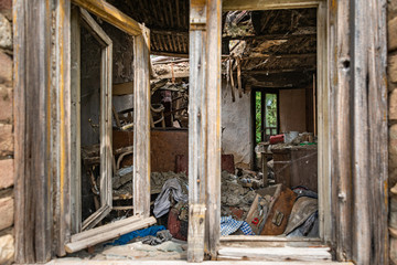 Abandoned home. Damaged house after earthquake.