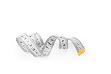 Flat lay twisted measuring tape isolated on white background