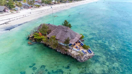 Zelfklevend Fotobehang Rock Restaurant over the sea in Zanzibar, Tanzania, Africa. © STORYTELLER