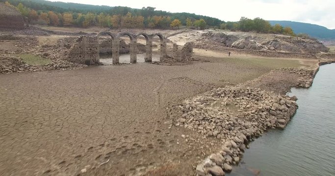 Cloister of a monastery in an almost dry marsh, La cuerda del pozo, Soria, Vinuesa, Spain. Filmed by a drone.