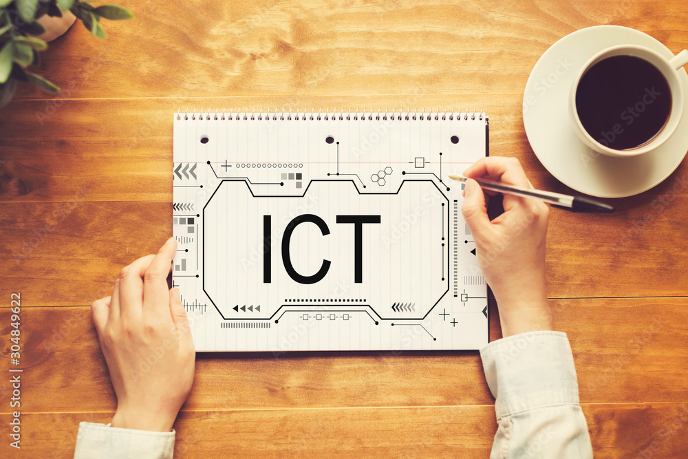 Poster information and communications technology with a person writing in a notebook on a wooden table
