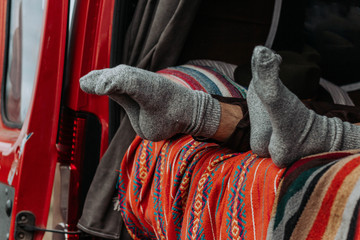 romantic journey in a van in autumn in warm socks