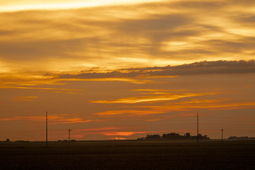 Fototapeta na wymiar sunset over the Nebraska fields