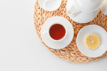 Tea set in a minimalistic Scandinavian style. White dishes on an isolated background. View from above.