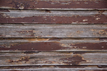 generic background of wooden half painted planks horizontal worn out brown paint