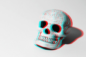 3D skull on grey background