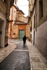 Fototapeta na wymiar Narrow San Juan de Dios street in Murcia
