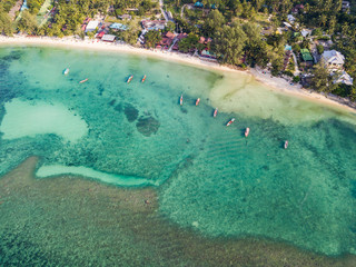 Fishing boats by the beach of Koh Phangan island