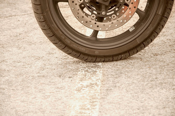 The wheel is on the start line.