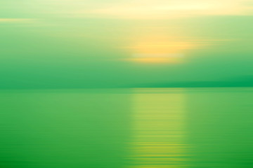 Fototapeta premium Abstract background motion blur sunset on the sea