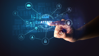 Hand touching ATTACK inscription, Cybersecurity concept