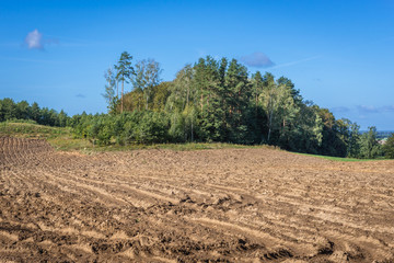 View on the plowed fields near Ornowo, small village near Ostroda town in Poland