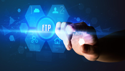 Hand touching FTP inscription, new technology concept