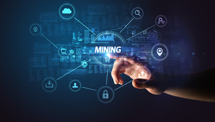 Hand touching MINING inscription, Cybersecurity concept