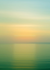 Naklejka na ściany i meble Abstract background motion blur sunset on the sea