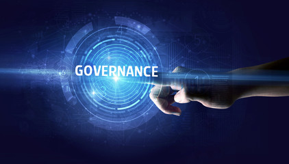 Hand touching GOVERNANCE button, modern business technology concept