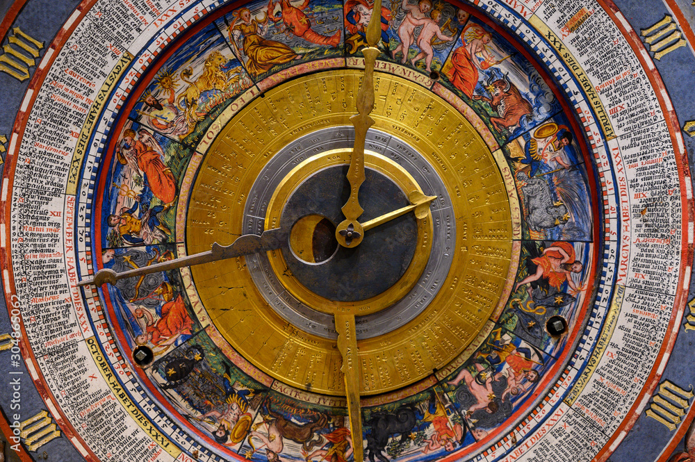 Wall mural an ancient clock with constellations
