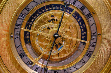 Fototapeta na wymiar an ancient clock with constellations 