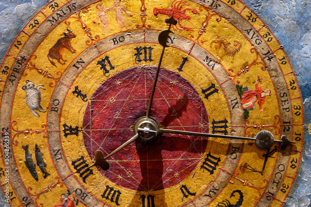 Wall mural an ancient clock with constellations