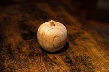 Wooden Apple on Wooden Surface