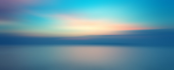 Motion blurred background of sunset on the sea