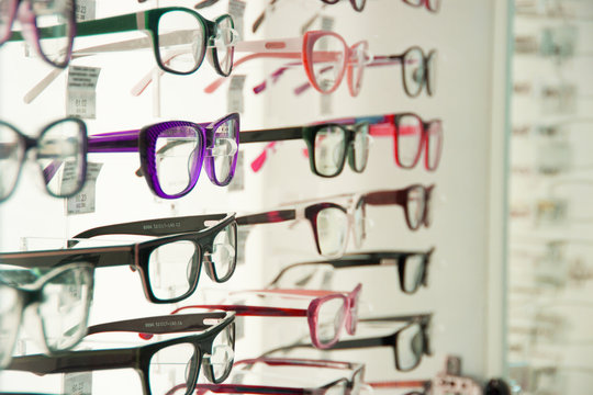 showcase with different spectacles, glasses