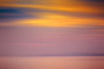 Motion blurred background of refraction in the sea